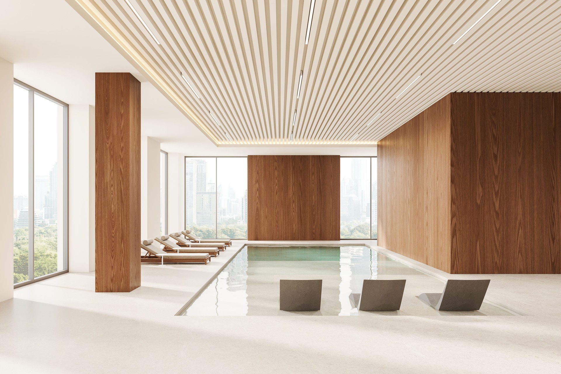 Minimalist luxury spa interior with loungers and panoramic window